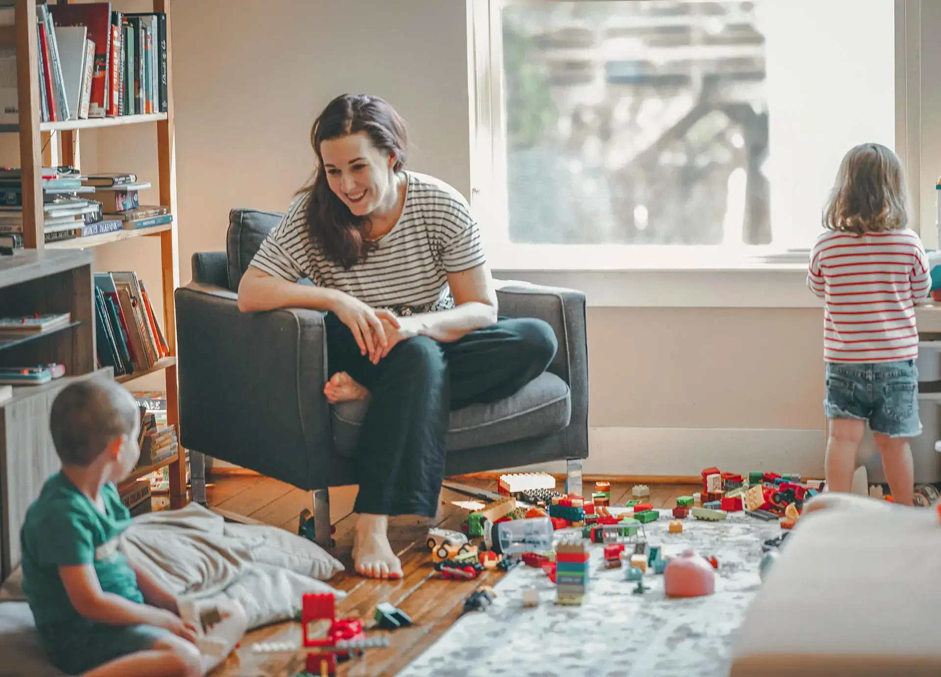 woman playing with kids